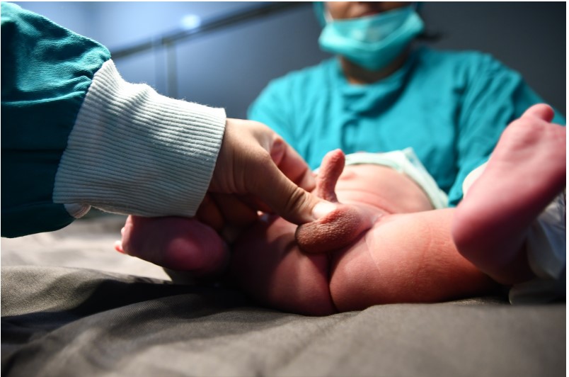 Doctor consulting with concerned parents